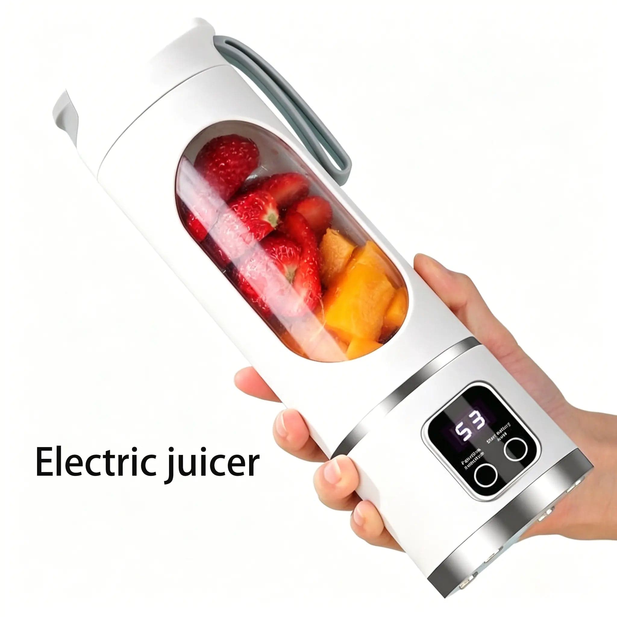 The Portable Blender in white, blending strawberries and mango